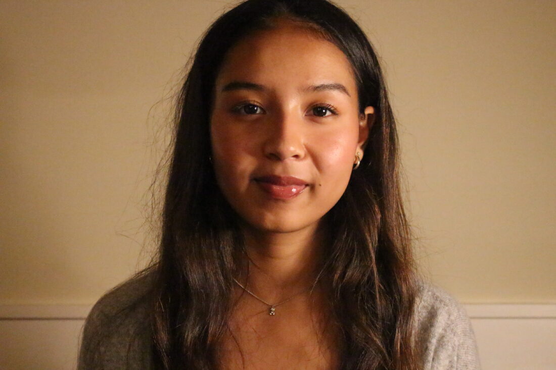 Serena Griffin, a member of The Representation Project's Youth Advisory Council, smiles slightly and looks directly at the camera against a softly lit background.