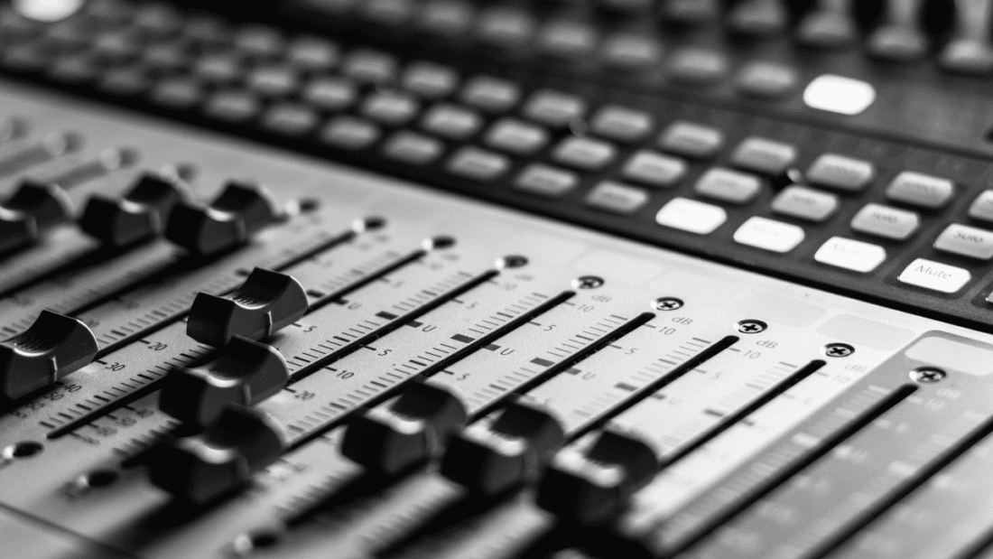 Close up of a mixer desk in a recording studio